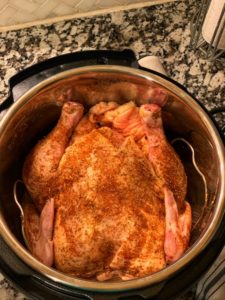 image shows chicken in an instant pot