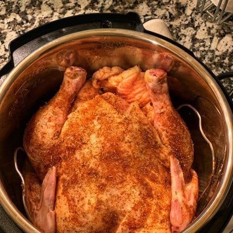 image shows chicken in an instant pot