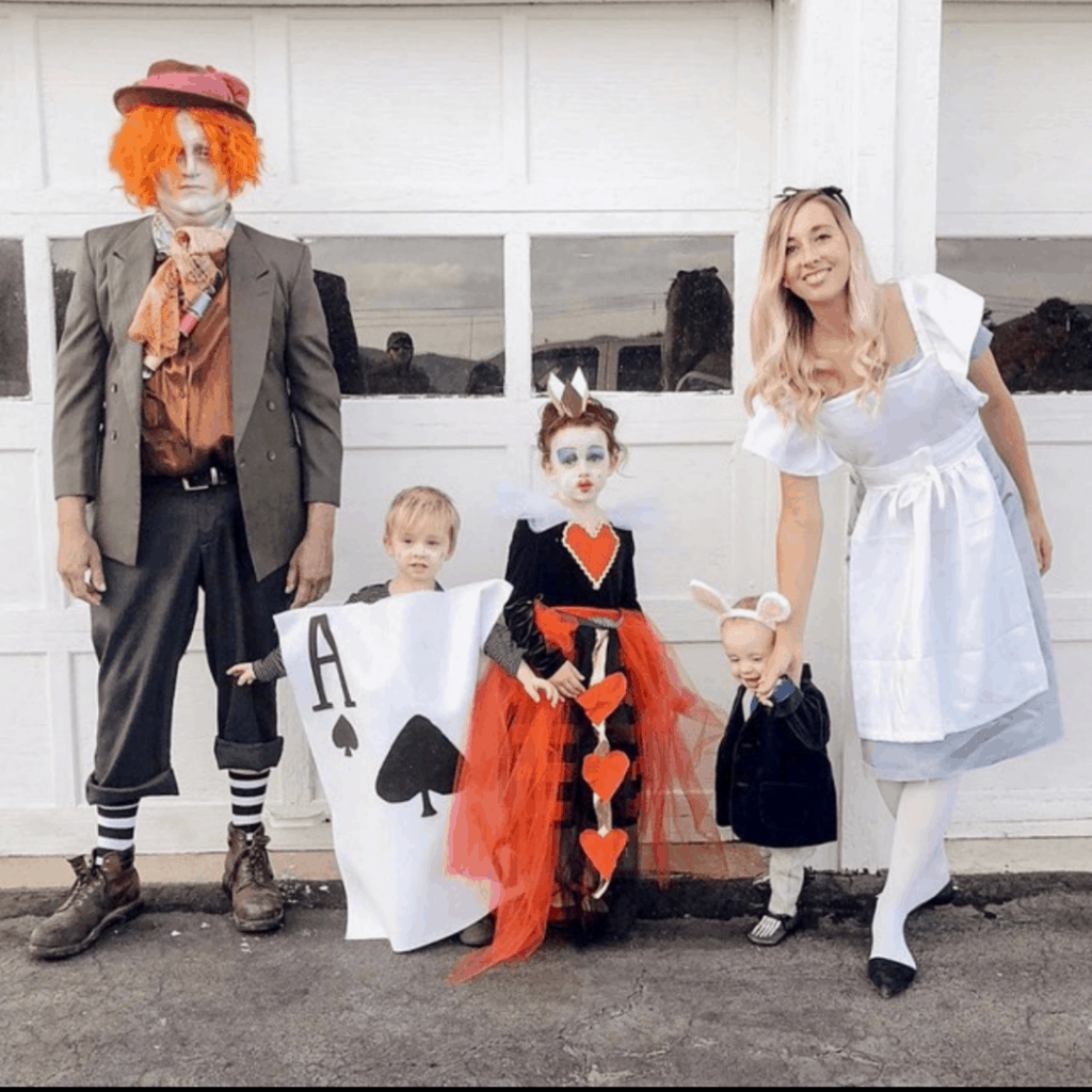 family dressed as alice in wonderland characters