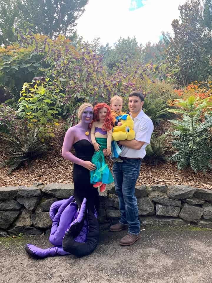 family dressed as characters from the little mermaid