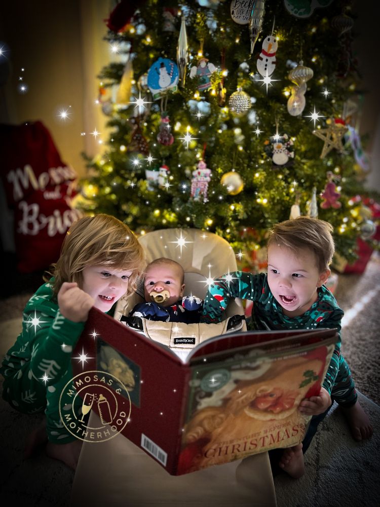 image shows children reading Twas the NIght before Christmas in front of a Christmas tree