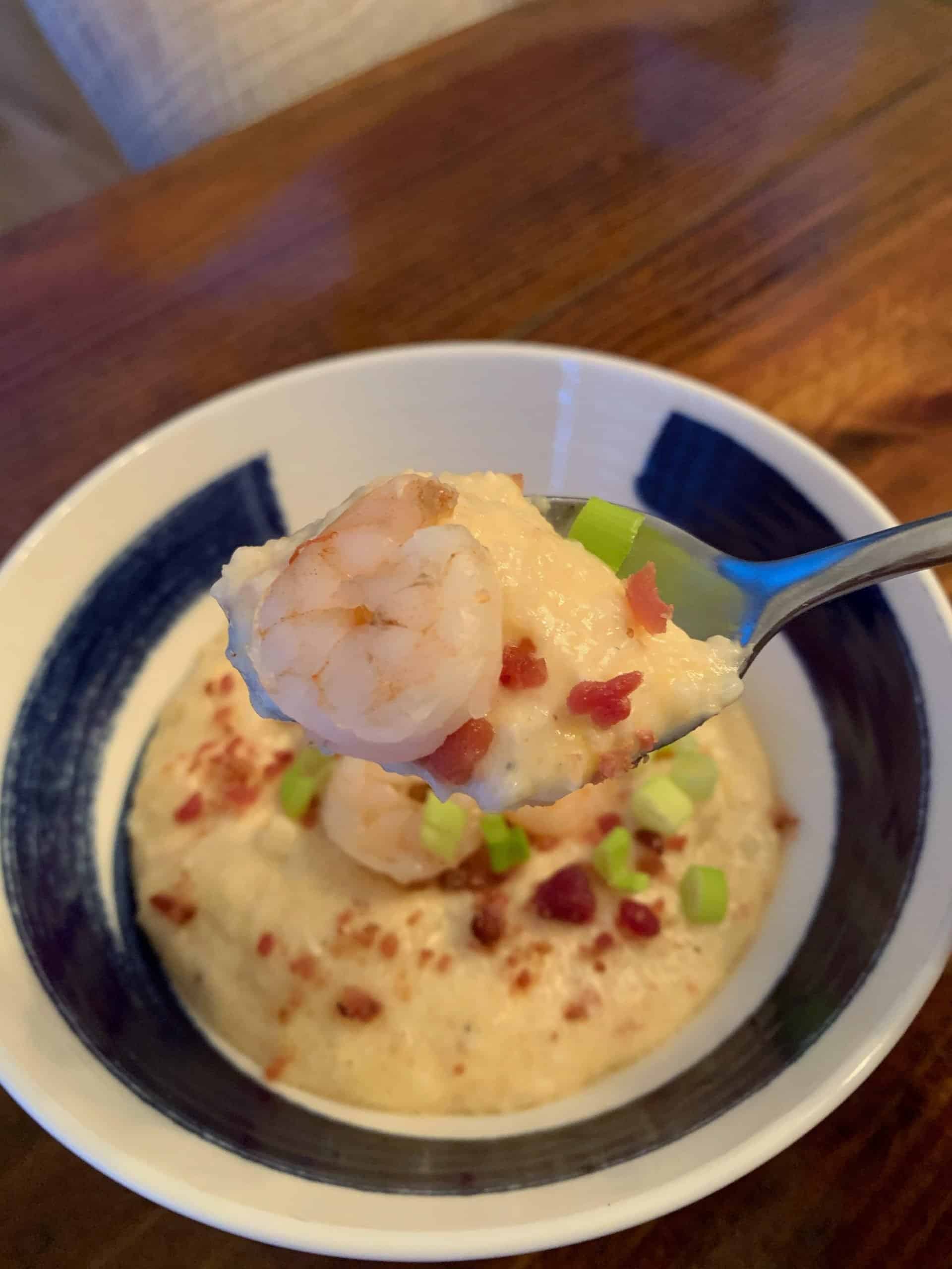 shows a bowl of shrimp and grits