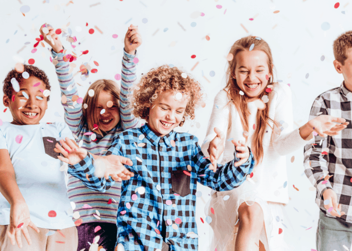 positive affirmations for little kids shows kids playing with confetti