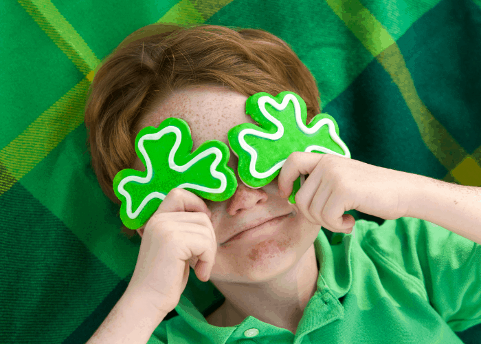 red headed boy with shamrocks