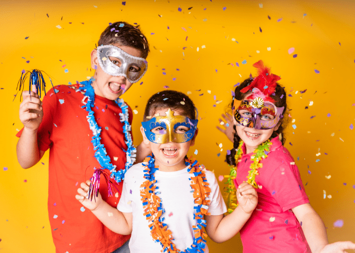 children celebrating new year's eve with sparkles