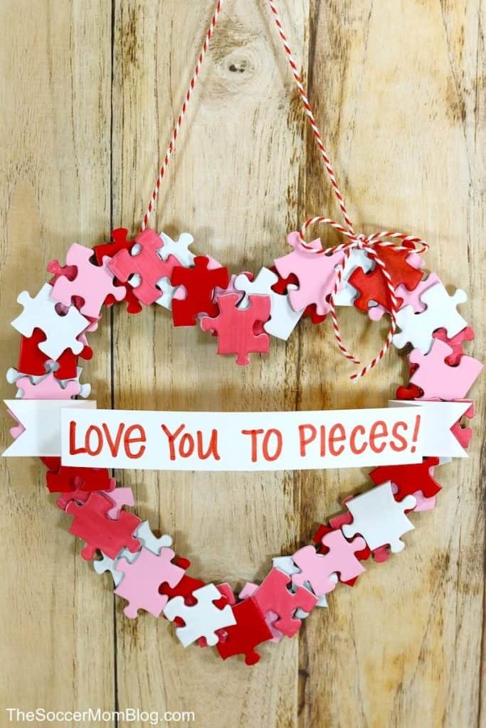 image shows a wreath made of puzzle pieces