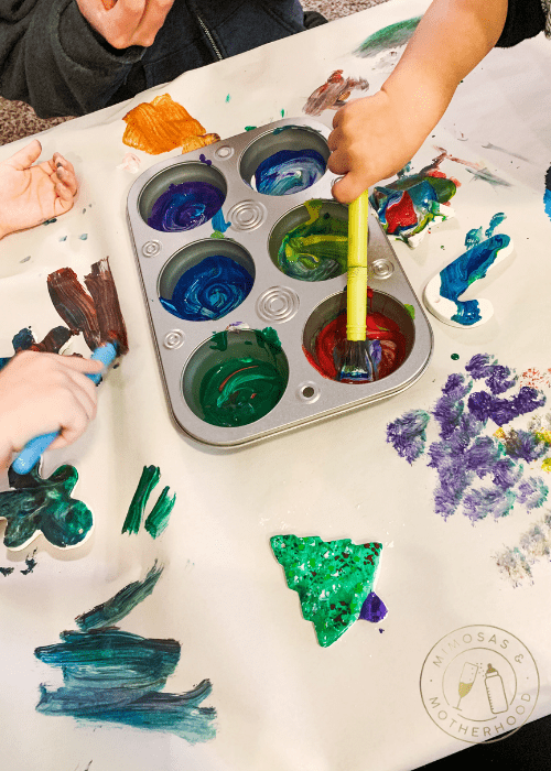 image shows painting air dry clay ornaments