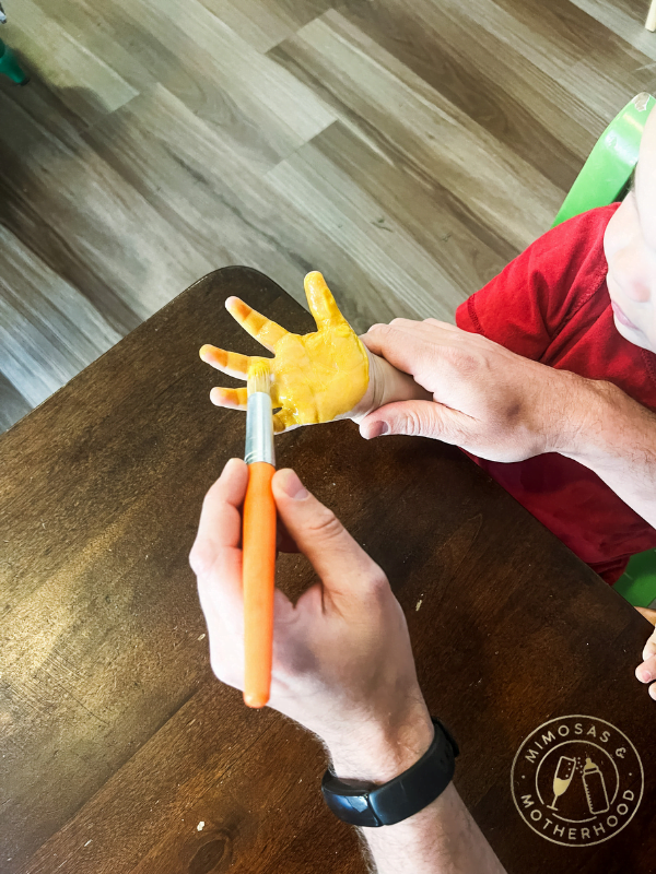 painting a child's hand