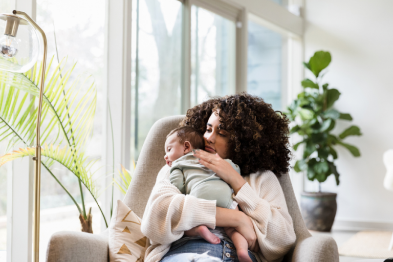 mom and baby in rocking chair