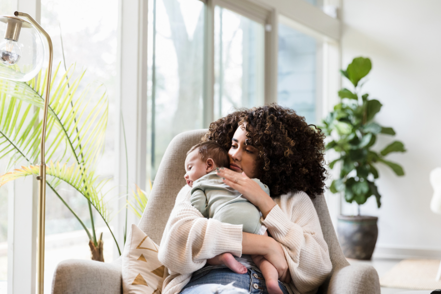 mom and baby in rocking chair