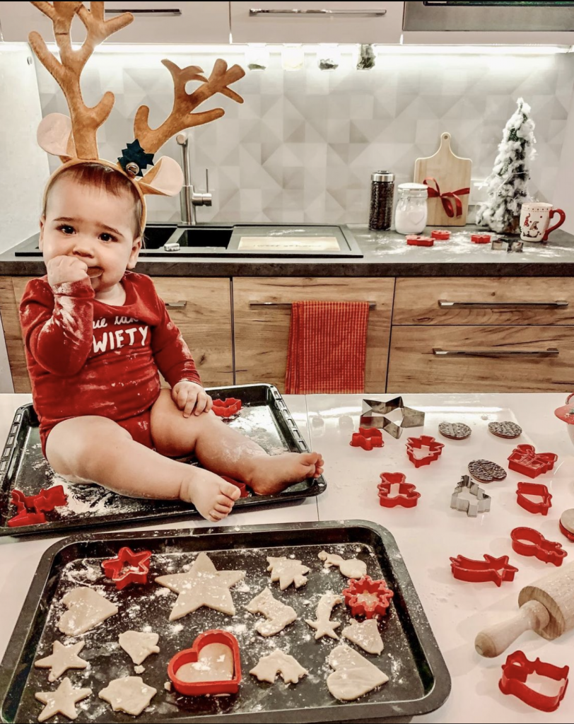 baby with Christmas cookies