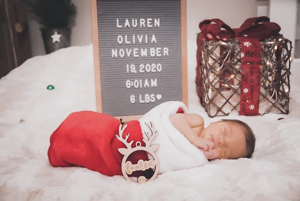 baby in a Christmas stocking