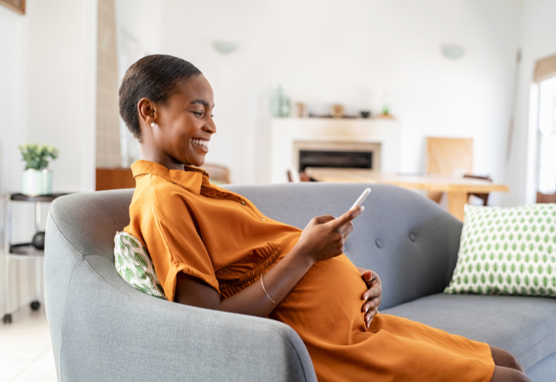 pregnant woman on phone