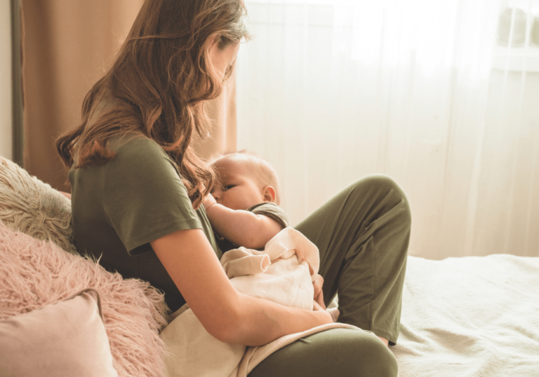 woman breastfeeding baby