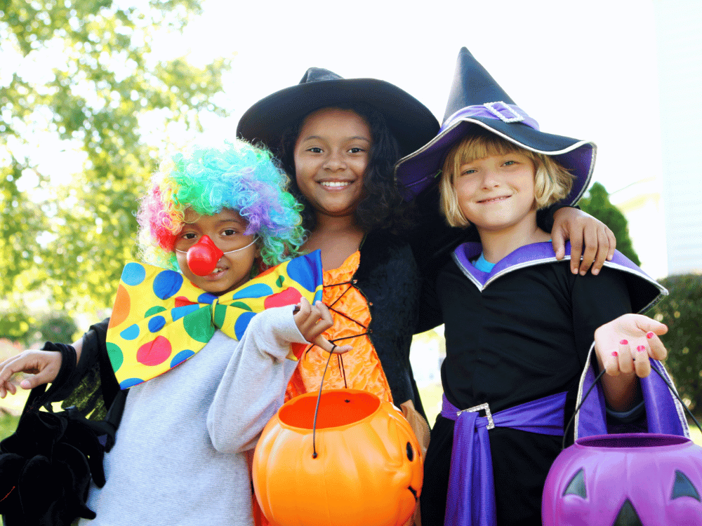 kids dressed up in halloween costumes