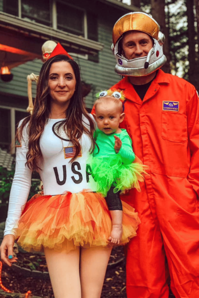 Astronauts with baby alien Halloween costume