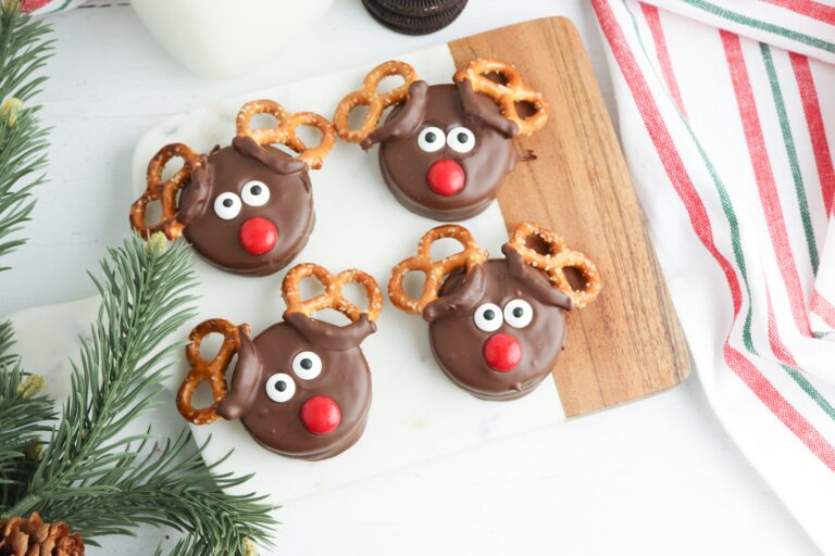 image shows chocolate covered reindeer oreos