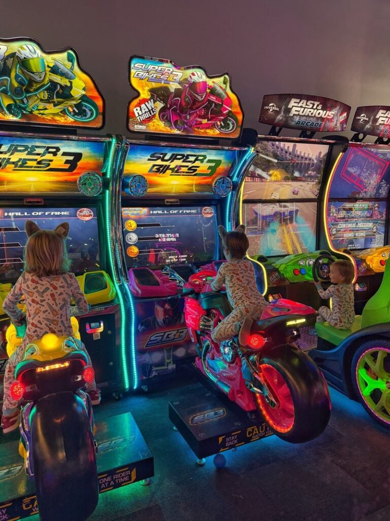 kids on arcade bikes