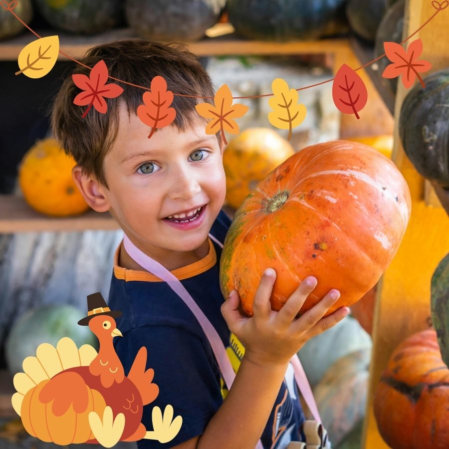 child holding pumpkin with turkey