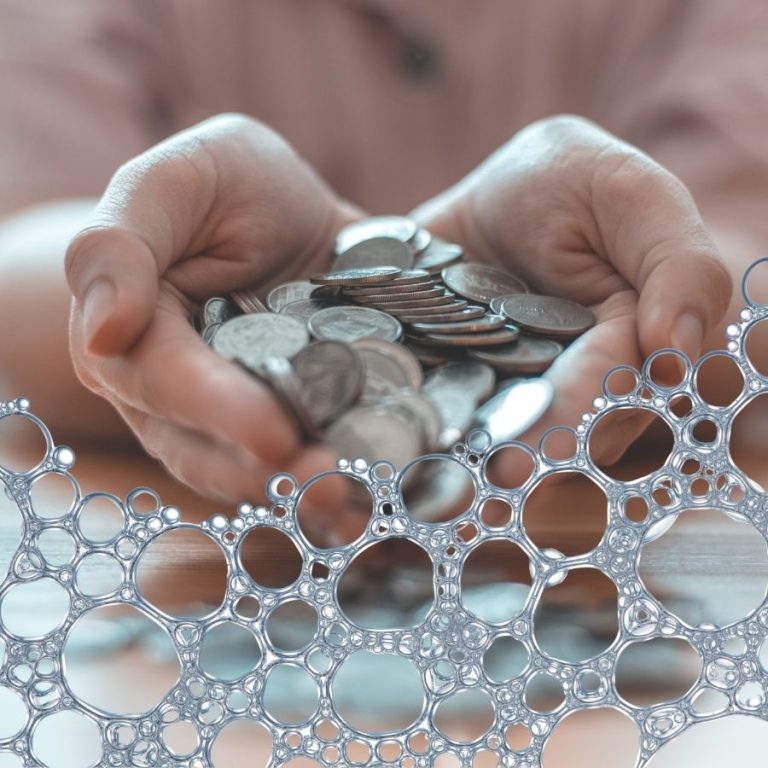 image shows nickel coins with soap bubbles