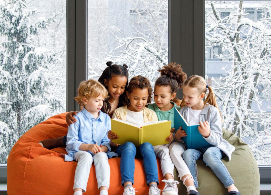 image shows kids reading during winter