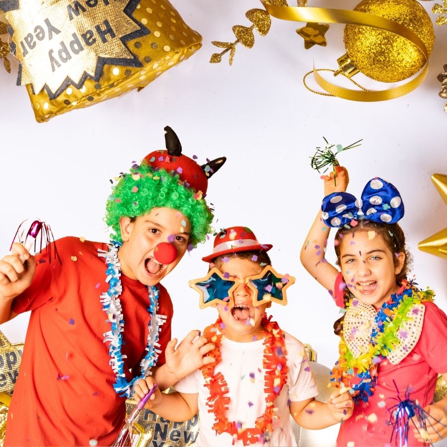 image shows kids celebrating new years eve