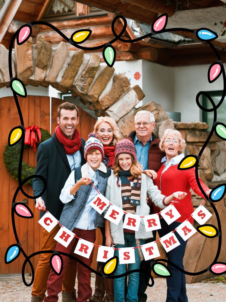 Family holding Merry Christmas sign outside