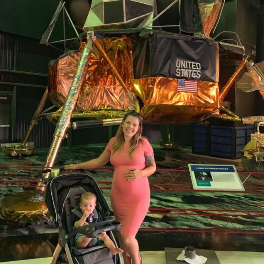 image shows a woman at the Space and Rocket Center in Huntsville AL