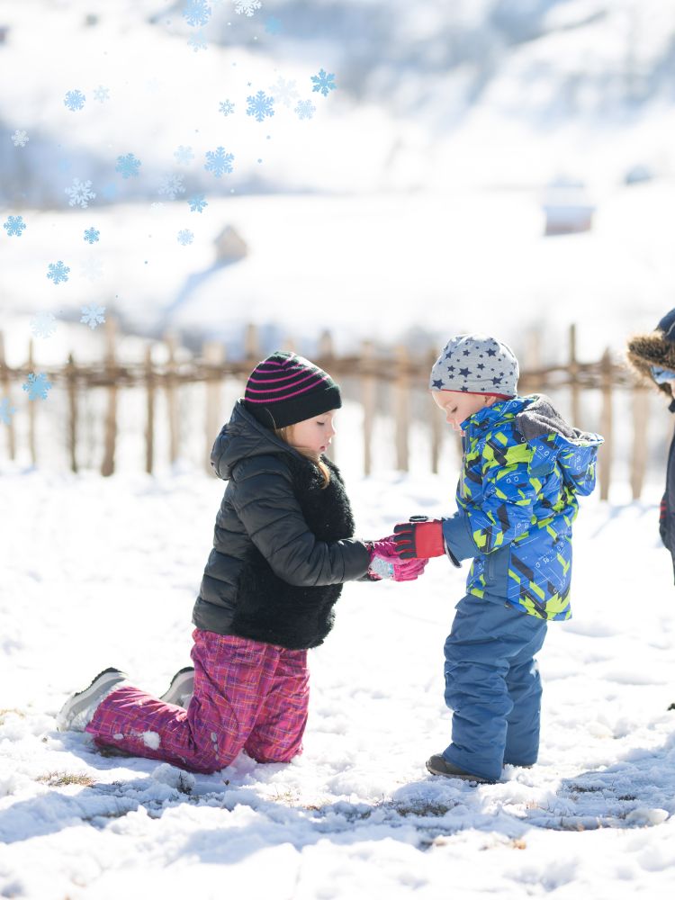 kids playing outside in the snow