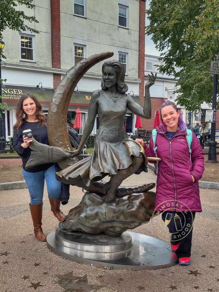 Two women at the Bewitched Statue in Salem MA