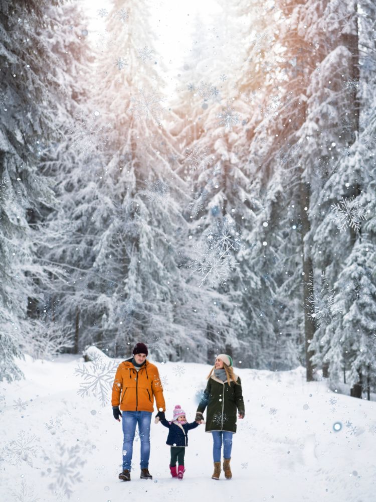 family on a nature walk outside during the winter