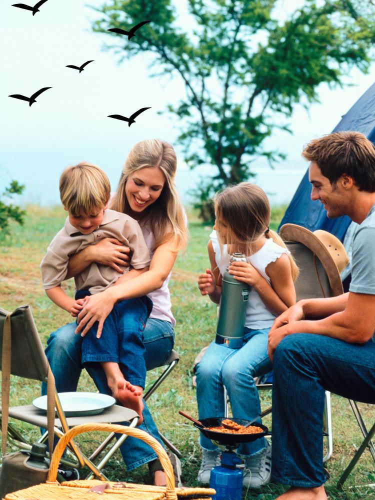 image shows a family camping together